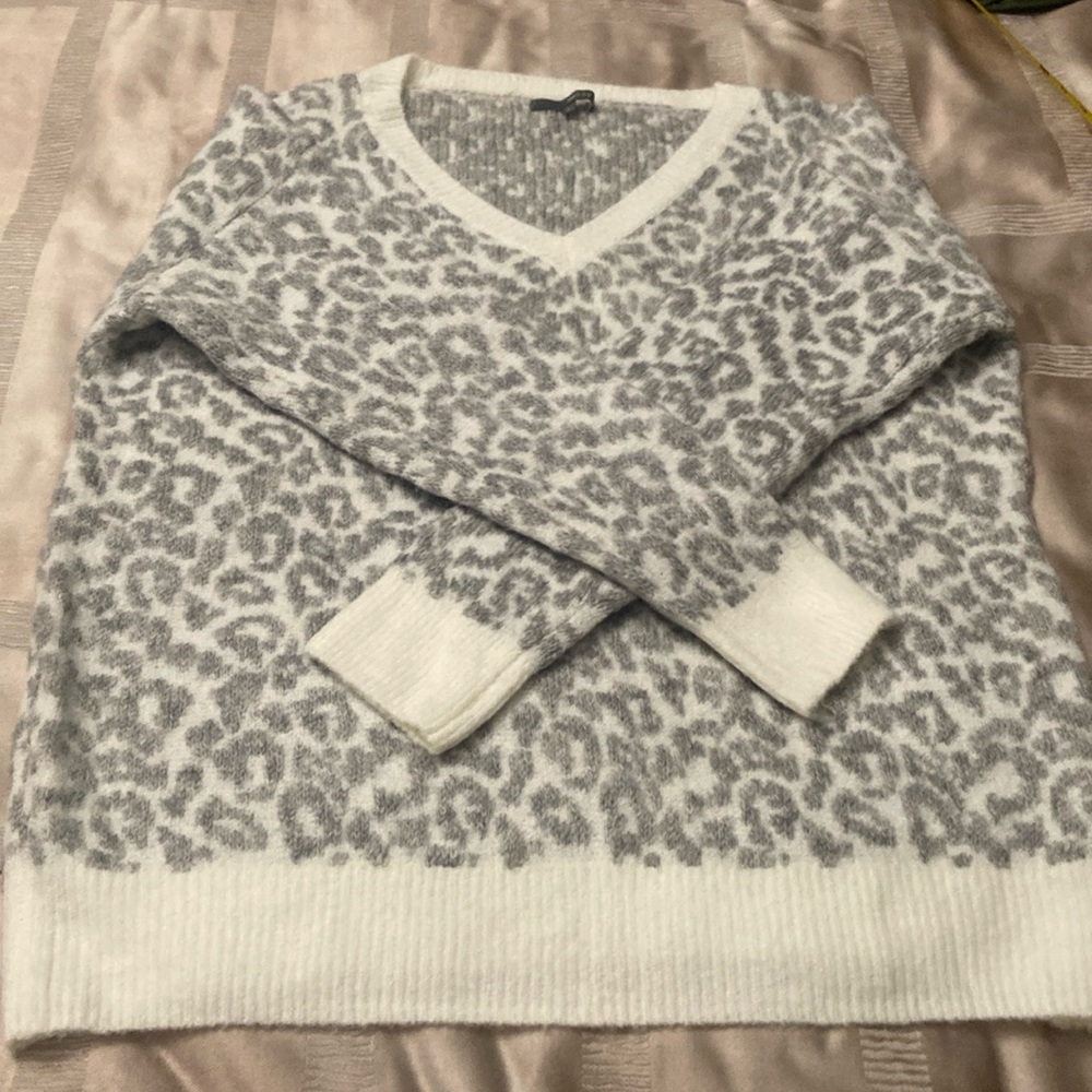 Soft grey leopard spotted sweater.